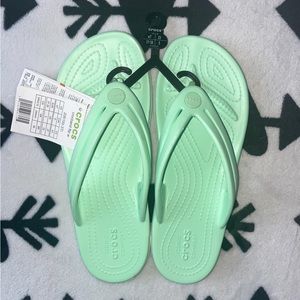 Mint green crocs flip flops